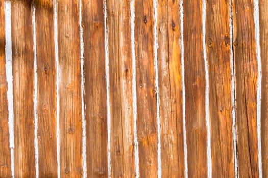 Decor cabin wood poles walls with white paste filler closeup texture detail background