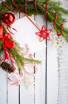 Christmas decorations on white wooden background