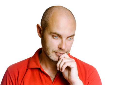Thoughtful unshaven man on a white background