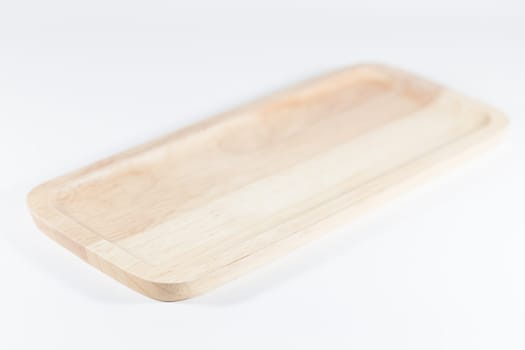 Wooden plate isolated on white background, stock photo