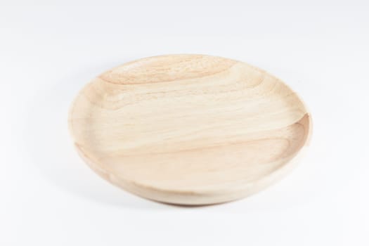 Wooden plate isolated on white background, stock photo