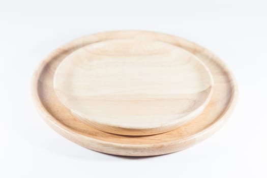 Wooden plate isolated on white background, stock photo