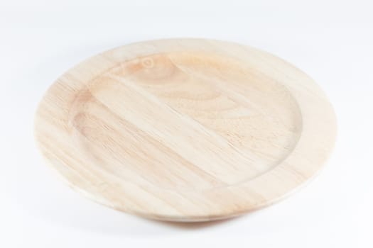 Wooden plate isolated on white background, stock photo
