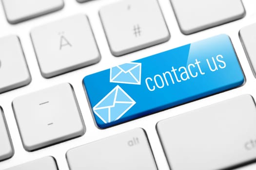 contact us key on white keyboard