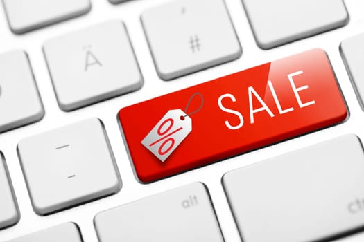 Sale online button on white keyboard
