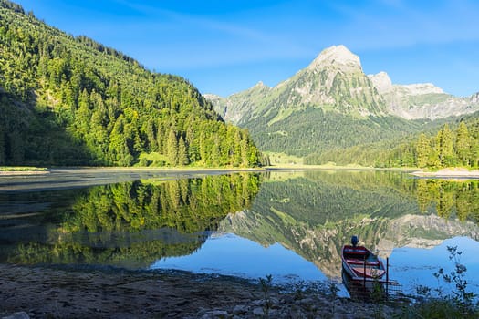 The boat and the mirrored lake