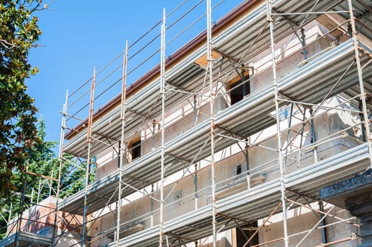 Building under construction with scaffolding