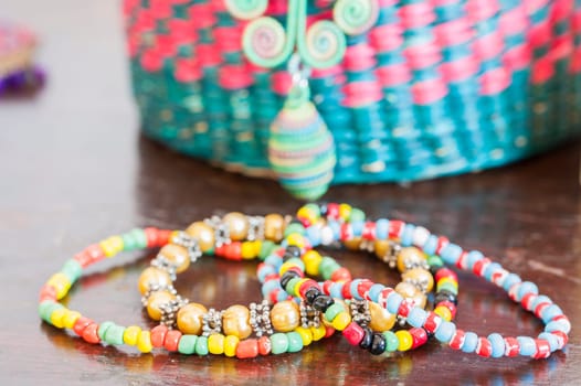Various bracelets colorful plastic beads. Costume jewelry for  woman