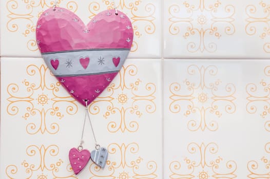 Heart with two large ceramic ceramic hearts on the wall