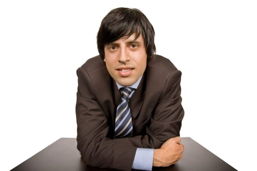 young business man on a desk, isolated on white