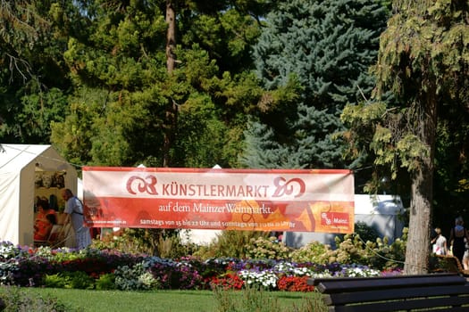 Mainz,Germany – August 29,2015: Wine lovers and art lovers visited the artists' market at the Mainz wine market in the Stadtpark and Rosengarten on 29 August 2015 in Mainz.