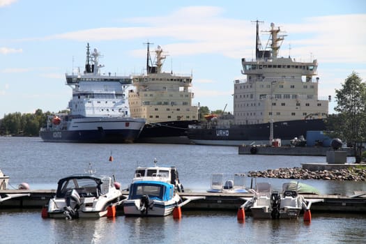 HELSINKI, FINLAND - JUNE 5, 2015: Photo of three icebreakers docked in the port