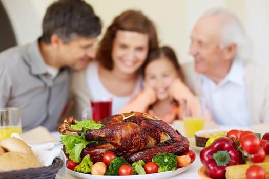 Homemade roasted turkey on served Thanksgiving table