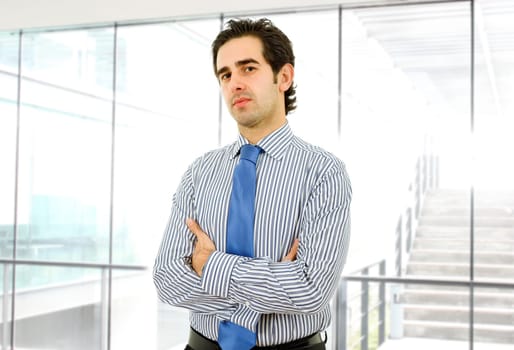 young business man portrait at the office