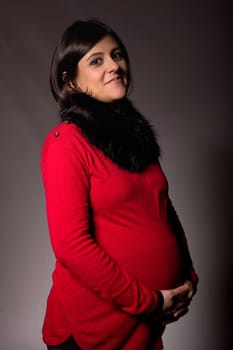 pregnant young woman studio picture
