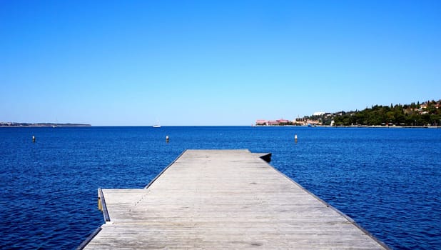 Wooden bridge or pier the sea with blue sky in Portoroz Slovenia