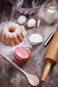 Baking utensils with ingredients for cake or cookies