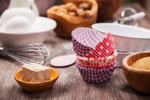 Baking utensils with ingredients for cake or cookies