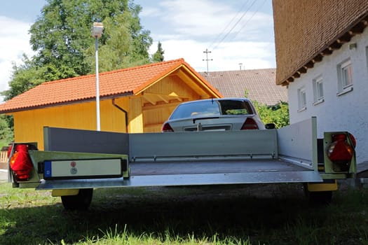 A car with a large trailer