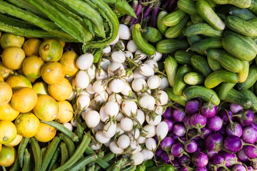 Exotic asian farmers market with various domestic colorful fresh fruits and vegetable.