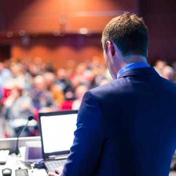 Speaker at Business Conference and Presentation. Audience at the conference hall.
