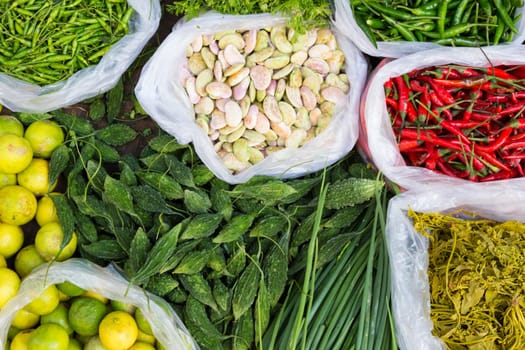 Exotic asian farmers market with various domestic colorful fresh fruits and vegetable.