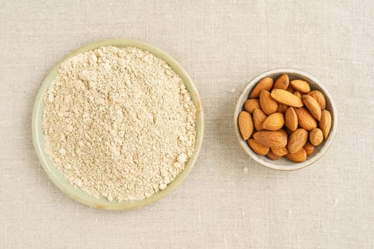 Almonds and almond flour in small potted bowls