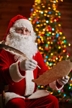 Happy Santa answering Christmas letter
