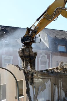 Demolition work with excavator