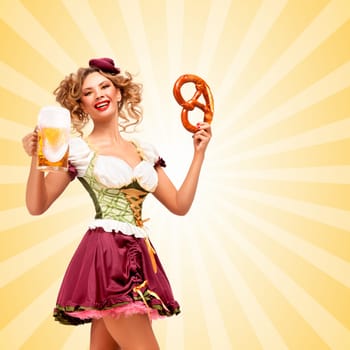 Beautiful sexy Oktoberfest waitress wearing a traditional Bavarian dress dirndl holding a pretzel and beer mug, and smiling happily on colorful abstract cartoon style background.