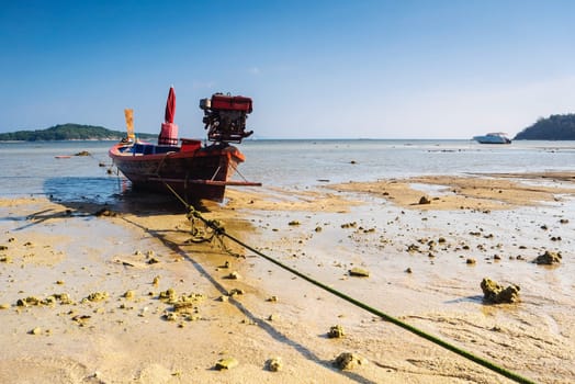 Boat on the beach with blue sky background, Rawai beach, Treval of thailand