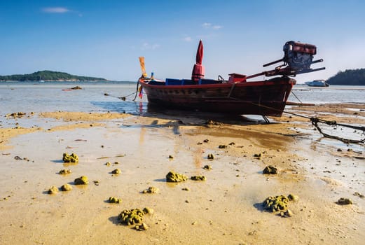 Boat on the beach with blue sky background, Rawai beach, Treval of thailand