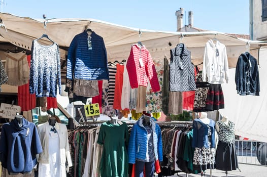 Clothes for sale at a local outdoor market. Italy