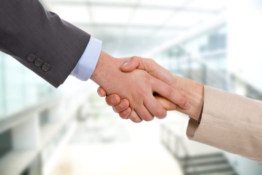 Business men hand shake at the office