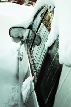 A car full of ice and snow in winter