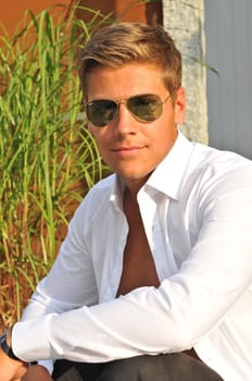 young pretty man,sympathetic,casual guy with many faces