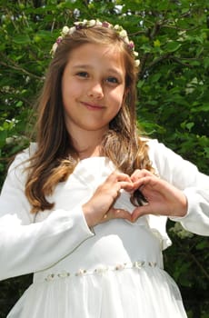 Communion child pretty girl with white dress
