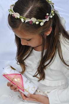 Communion child pretty girl with white dress