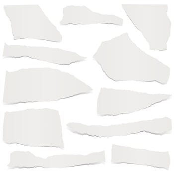 collection of gray colored scraps of papers with shadows