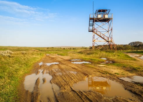 Lonely old watchtower on the way