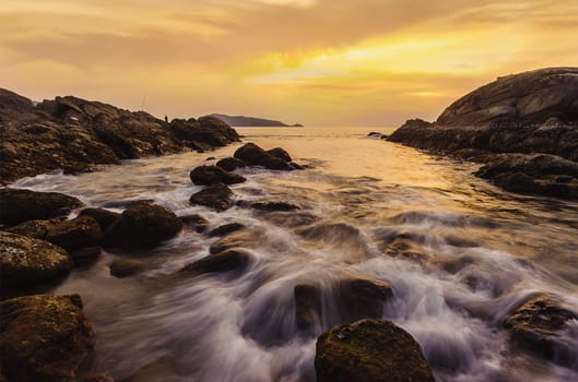 Seascape colorful with color of sunset in twilight, Long speed shutter technique