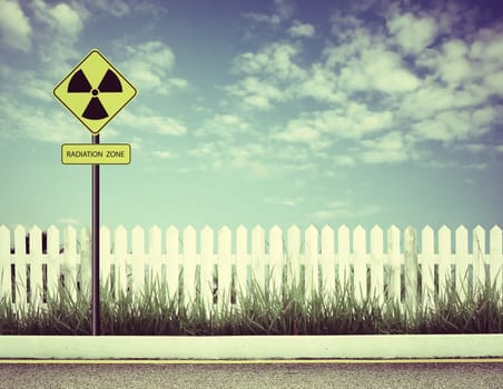 nuclear radiation warning symbol with blue sky