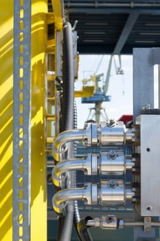 Chrome-plated supply lines in the port of Warnemünde