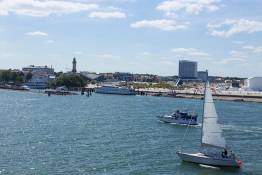 Sailboats,cash registers and ferries in the ferry port of Warnemünde