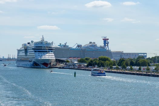 Two large cruise ships in the ferry port of Warnemünde