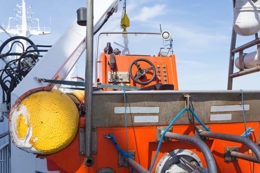 Steering position of a lifeboat on the deck of a large car ferry