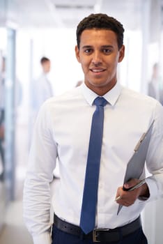 Elegant businessman looking at camera