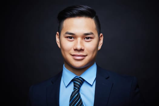 Face of handsome businessman looking at camera