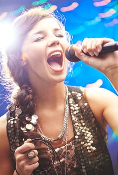 Glamorous girl singing emotional song