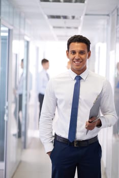 Handsome professional in formalwear looking at camera